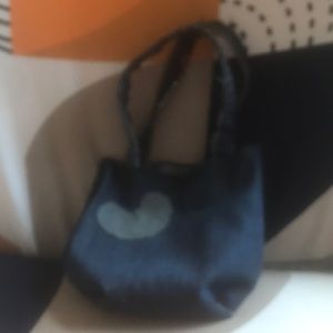 Going for 8 dollars blue Jean purse